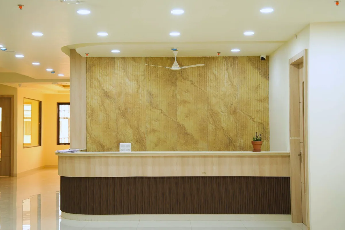 The reception, the fluted wall behind the desk